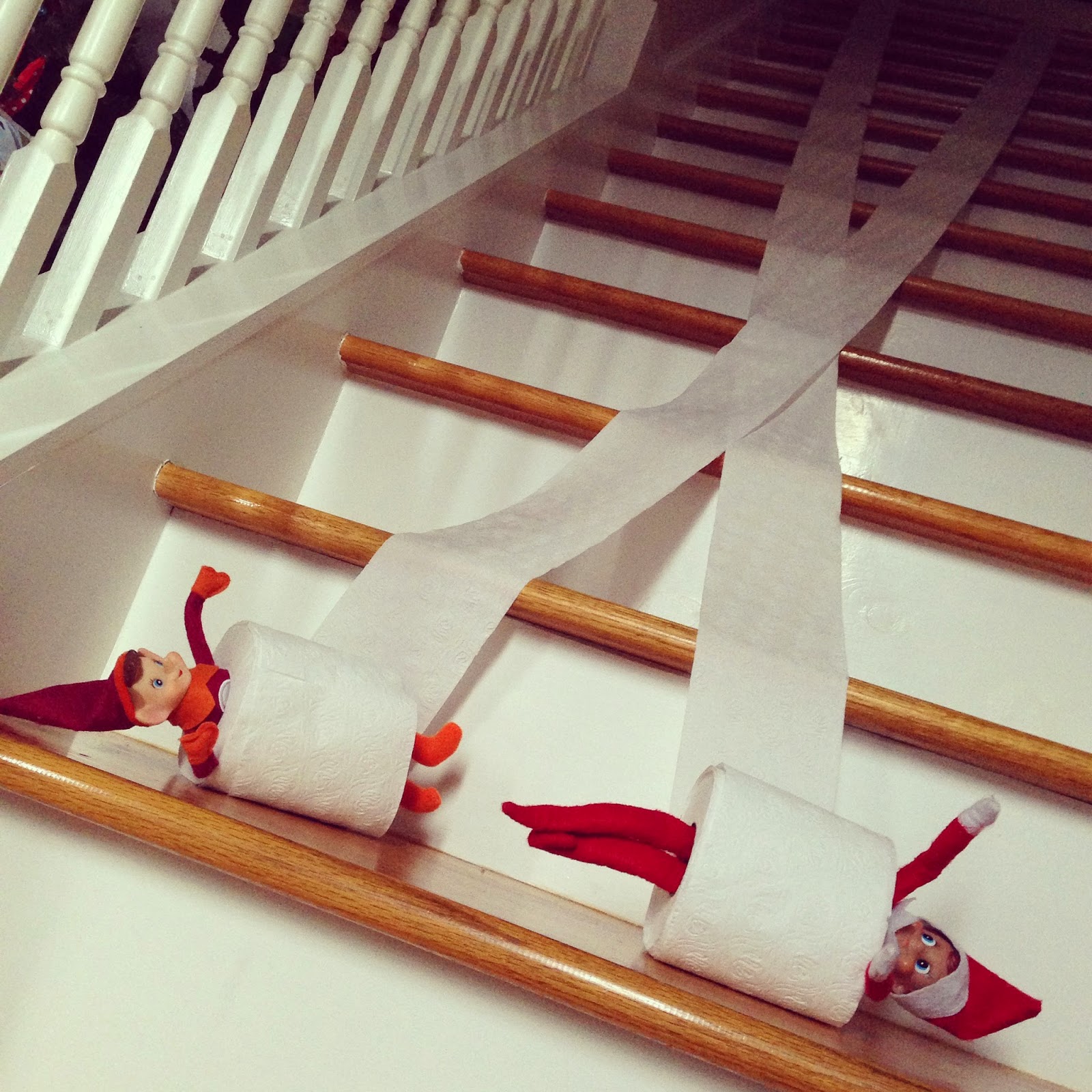 30 fun and unique Elf on the Shelf Ideas - Elf On the Shelf Toilet Paper race downstairs